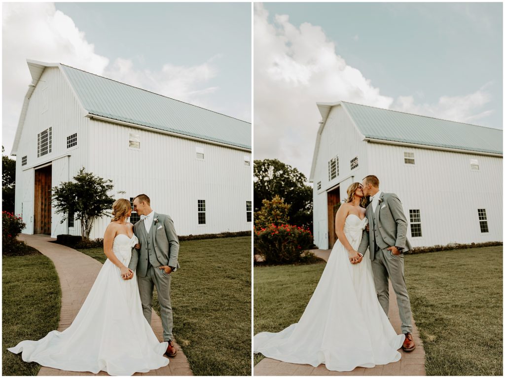 bride and groom in front of barn